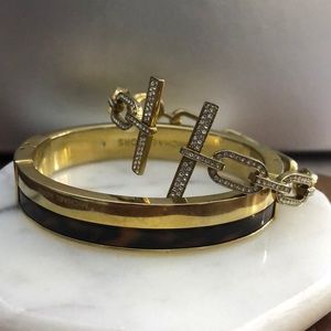 Two Michael kors bangels